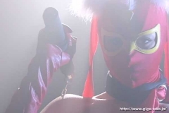 GGTB-09 ヒロインクンニ地獄　セクシー仮面編